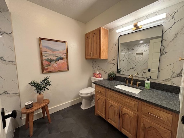 11790 E Etowah Rd, Noble, OK 73068 - full bath with toilet, vanity, baseboards, and a marble finish shower