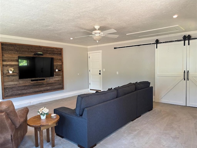 11790 E Etowah Rd, Noble, OK 73068 - living area with ceiling fan, ornamental molding, attic access, light carpet, and a textured ceiling