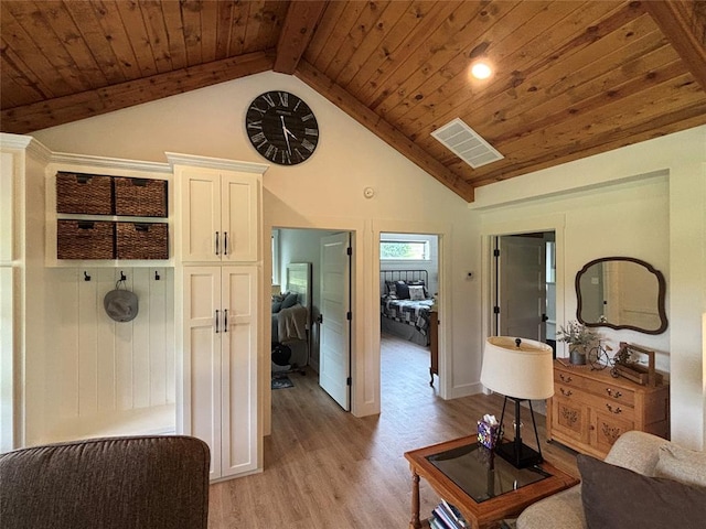 11790 E Etowah Rd, Noble, OK 73068 - living area featuring wooden ceiling with exposed beams, light wood-style floors, and high vaulted ceiling