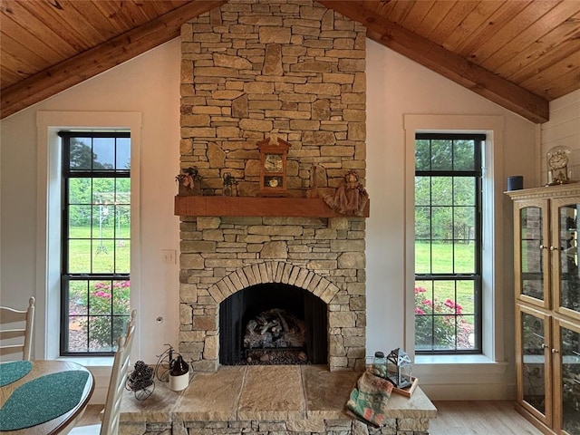 11790 E Etowah Rd, Noble, OK 73068 - living area featuring wood ceiling, wood finished floors, plenty of natural light, and a fireplace