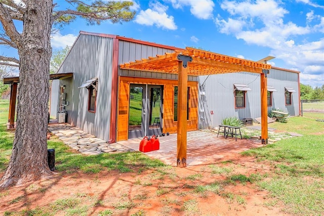 11790 E Etowah Rd, Noble, OK 73068 - rear view of house with french doors and a patio area