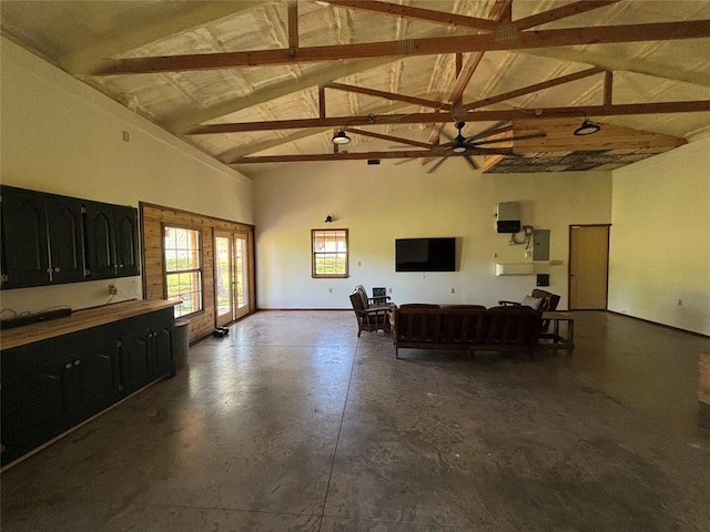 11790 E Etowah Rd, Noble, OK 73068 - living area featuring high vaulted ceiling, concrete flooring, baseboards, and beamed ceiling