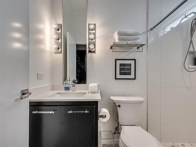 15929 Aparados Way, Edmond, OK 73013 - bathroom with toilet, vanity, and a tile shower
