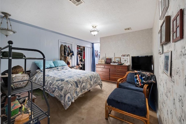 5712 NW 34th St, Oklahoma City, OK 73122 - bedroom featuring carpet floors, a textured ceiling, and ornamental molding