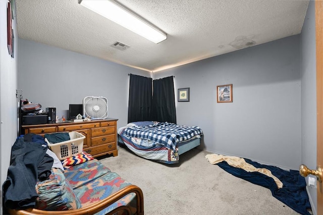 5712 NW 34th St, Oklahoma City, OK 73122 - carpeted bedroom with a textured ceiling