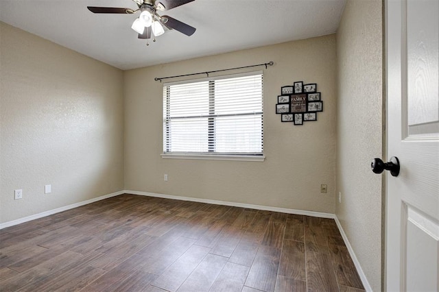 1001 Glacier Ln, Edmond, OK 73003 - spare room with ceiling fan, wood finished floors, and baseboards