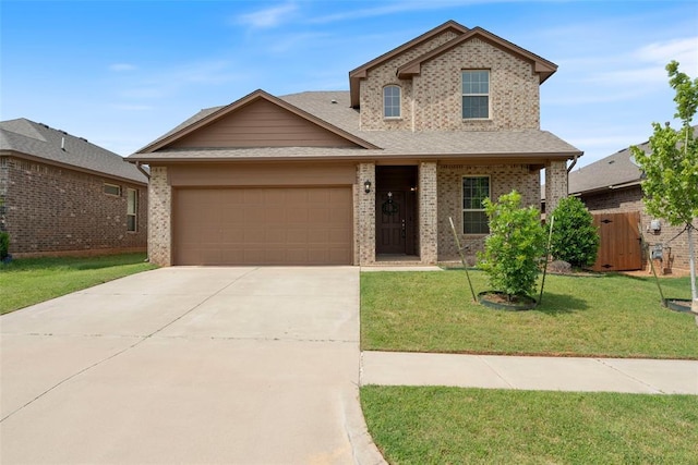 11325 SW 34th Ter, Yukon, OK 73099 - traditional-style home with an attached garage, brick siding, concrete driveway, and roof with shingles