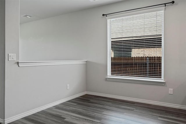 11325 SW 34th Ter, Yukon, OK 73099 - unfurnished room with wood finished floors and baseboards