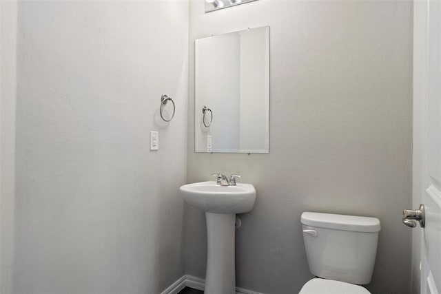 11325 SW 34th Ter, Yukon, OK 73099 - bathroom featuring toilet and a sink