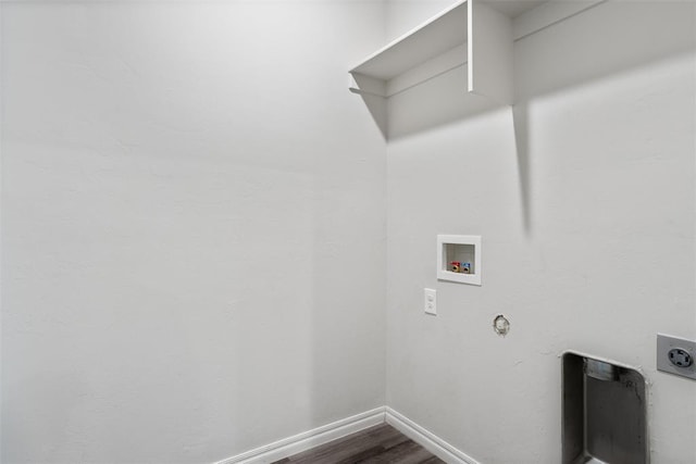11325 SW 34th Ter, Yukon, OK 73099 - laundry room with hookup for an electric dryer, hookup for a washing machine, dark wood-style floors, and baseboards