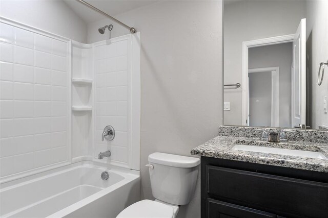 11325 SW 34th Ter, Yukon, OK 73099 - bathroom featuring toilet, tub / shower combination, and vanity