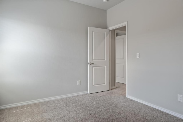 11325 SW 34th Ter, Yukon, OK 73099 - unfurnished bedroom featuring carpet floors and baseboards