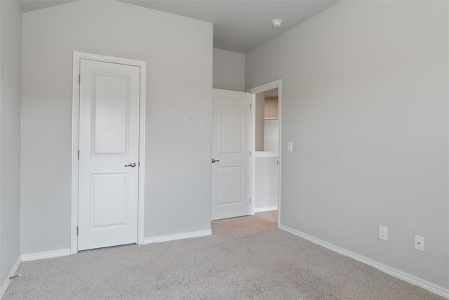11325 SW 34th Ter, Yukon, OK 73099 - unfurnished bedroom with carpet flooring and baseboards