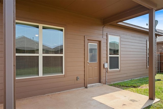 11325 SW 34th Ter, Yukon, OK 73099 - view of exterior entry with a patio