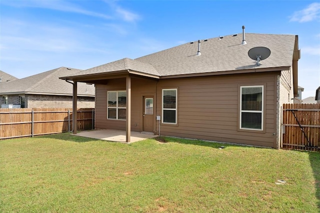 11325 SW 34th Ter, Yukon, OK 73099 - rear view of house with a patio area