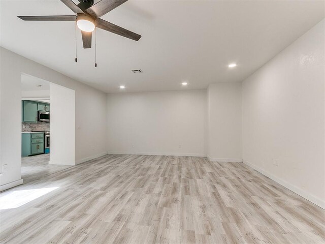 10125 N Pennsylvania Ave Unit 4, Oklahoma City, OK 73120 - empty room with light wood finished floors, recessed lighting, ceiling fan, and baseboards