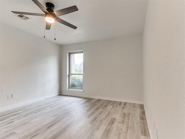 10125 N Pennsylvania Ave Unit 4, Oklahoma City, OK 73120 - unfurnished room featuring light wood-type flooring, ceiling fan, and baseboards