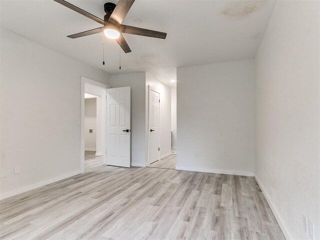 10125 N Pennsylvania Ave Unit 4, Oklahoma City, OK 73120 - empty room featuring a ceiling fan, light wood finished floors, and baseboards