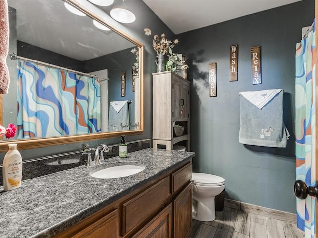 19609 Filly Dr, Edmond, OK 73003 - full bath featuring vanity, toilet, baseboards, and a shower with curtain