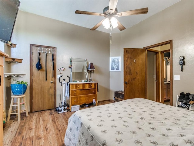 19609 Filly Dr, Edmond, OK 73003 - bedroom featuring wood finished floors and a ceiling fan