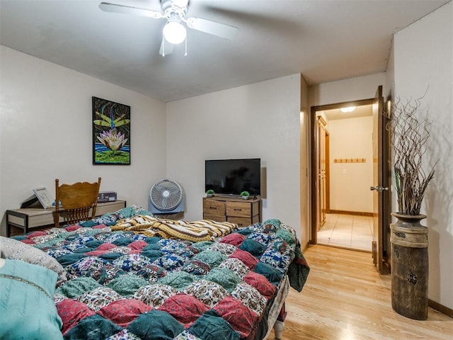 19609 Filly Dr, Edmond, OK 73003 - bedroom with light wood-style floors and ceiling fan