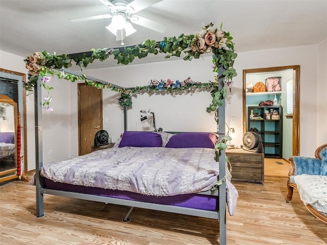 19609 Filly Dr, Edmond, OK 73003 - bedroom featuring light wood-style flooring and ceiling fan