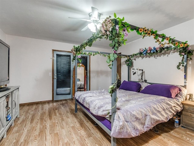 19609 Filly Dr, Edmond, OK 73003 - bedroom with light wood-style floors, ceiling fan, and access to outside