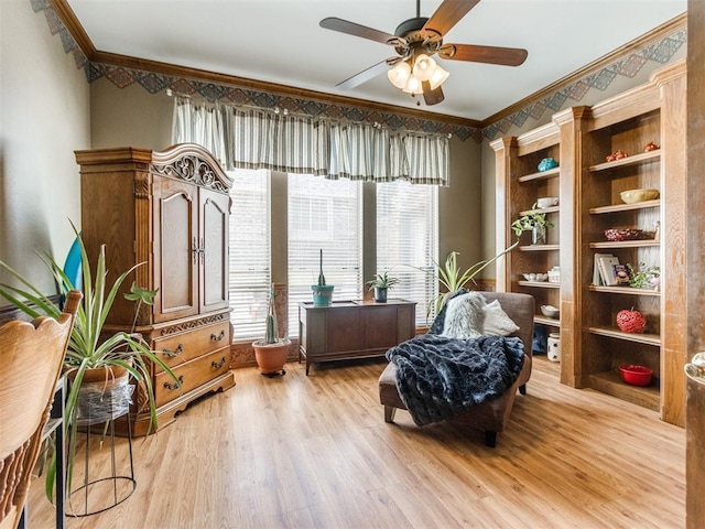 19609 Filly Dr, Edmond, OK 73003 - living area featuring ornamental molding, light wood-style floors, and ceiling fan