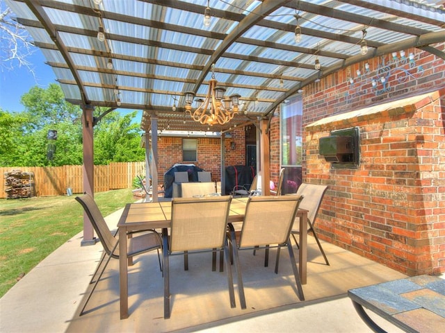 19609 Filly Dr, Edmond, OK 73003 - view of patio featuring outdoor dining space, a pergola, and grilling area