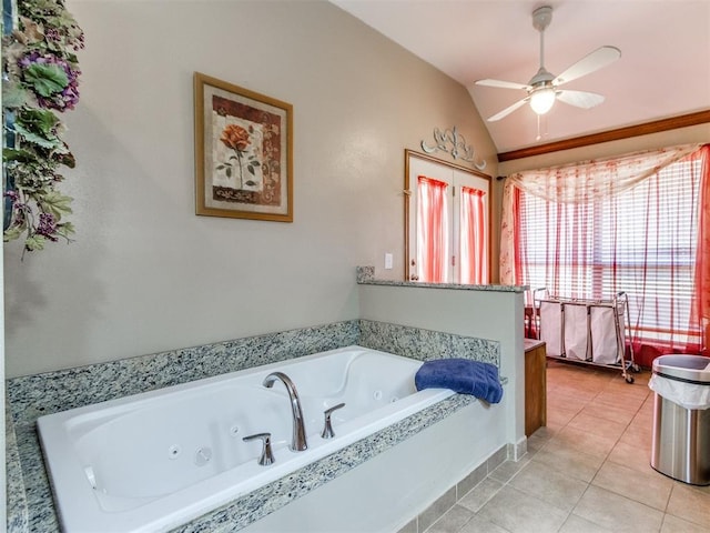 19609 Filly Dr, Edmond, OK 73003 - bathroom with a whirlpool tub, vaulted ceiling, tile patterned floors, and ceiling fan
