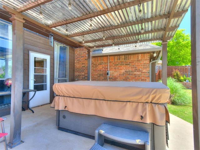 19609 Filly Dr, Edmond, OK 73003 - view of patio / terrace with a hot tub and a pergola