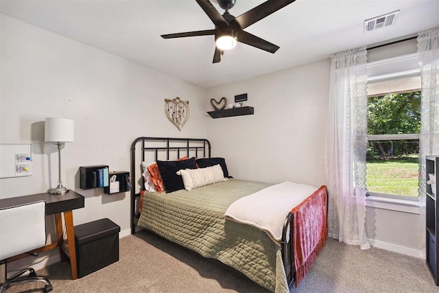 4706 Red Hawk St, Guthrie, OK 73044 - carpeted bedroom featuring baseboards and ceiling fan