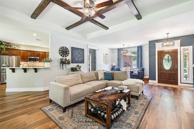 4706 Red Hawk St, Guthrie, OK 73044 - living room with baseboards, beam ceiling, wood finished floors, a ceiling fan, and coffered ceiling