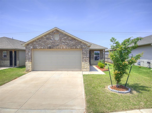 11621 Jude Way, Yukon, OK 73099 - ranch-style house with brick siding, a front yard, driveway, an attached garage, and stone siding