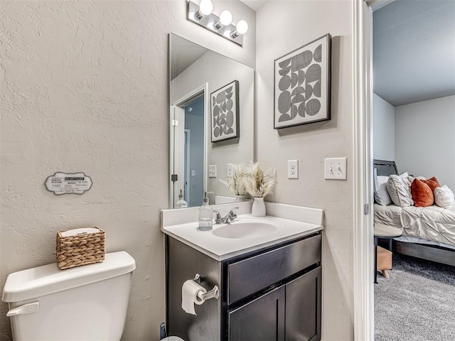 11621 Jude Way, Yukon, OK 73099 - half bathroom with vanity, toilet, and ensuite bathroom