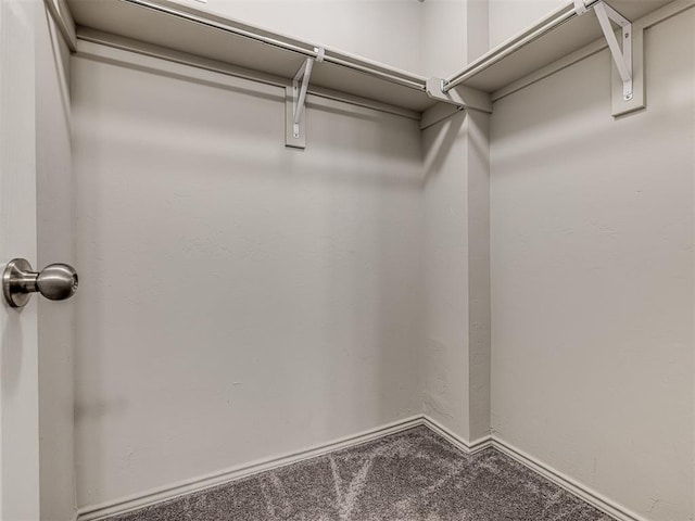 11621 Jude Way, Yukon, OK 73099 - spacious closet featuring carpet