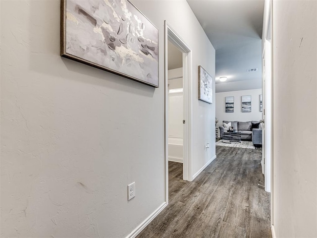 11621 Jude Way, Yukon, OK 73099 - hall featuring wood finished floors and baseboards