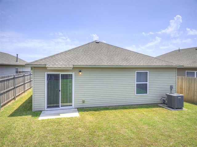 11621 Jude Way, Yukon, OK 73099 - back of house with central air condition unit and a shingled roof