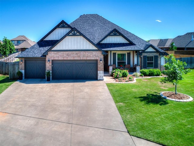 12801 Red Spruce Cir, Oklahoma City, OK 73142 - view of front of home featuring brick siding, a garage, driveway, a shingled roof, and board and batten siding