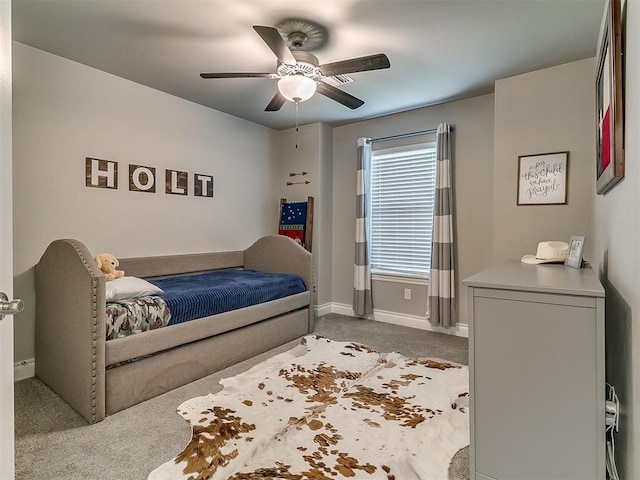 12801 Red Spruce Cir, Oklahoma City, OK 73142 - bedroom featuring carpet flooring, baseboards, and a ceiling fan