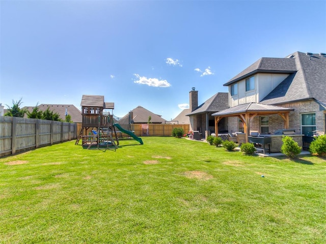 12801 Red Spruce Cir, Oklahoma City, OK 73142 - view of yard featuring a playground, a gazebo, and a patio area