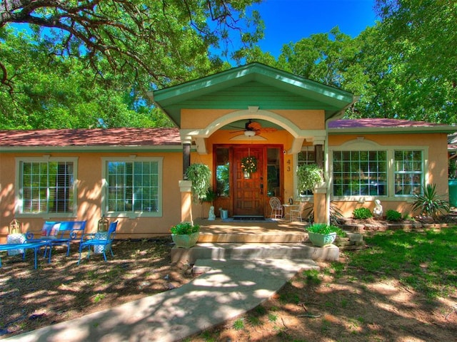 43 W Shore Dr, Arcadia, OK 73007 - property entrance with ceiling fan and stucco siding