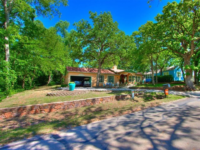 43 W Shore Dr, Arcadia, OK 73007 - ranch-style house featuring a chimney