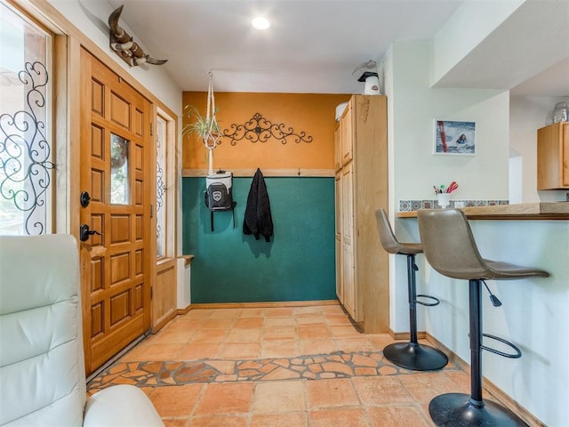 43 W Shore Dr, Arcadia, OK 73007 - entrance foyer with stone tile flooring and baseboards
