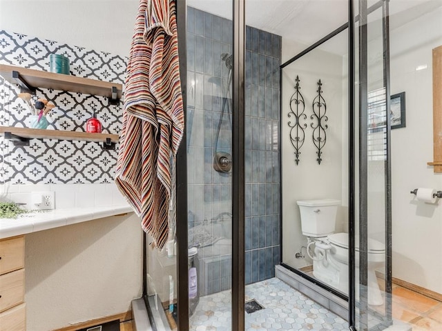 43 W Shore Dr, Arcadia, OK 73007 - bathroom featuring toilet, a shower stall, and backsplash