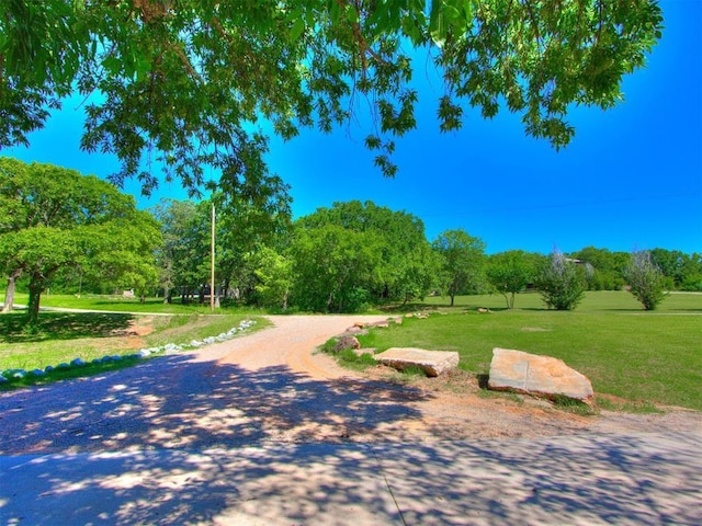 43 W Shore Dr, Arcadia, OK 73007 - view of street featuring view of wooded area