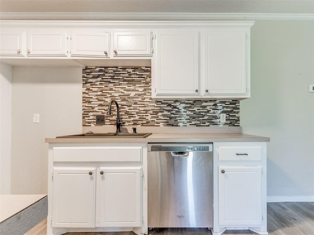 18 Whispering Meadows Rd, Shawnee, OK 74804 - kitchen with dishwasher, a sink, backsplash, and light countertops