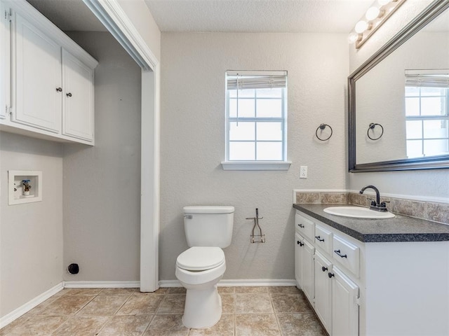 18 Whispering Meadows Rd, Shawnee, OK 74804 - bathroom featuring vanity, plenty of natural light, toilet, and baseboards