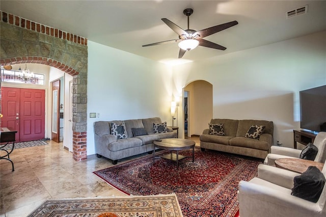 3417 Lyle Rd, Weatherford, OK 73096 - living room featuring arched walkways and ceiling fan