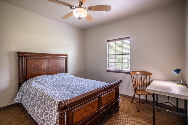 3417 Lyle Rd, Weatherford, OK 73096 - carpeted bedroom featuring baseboards and a ceiling fan